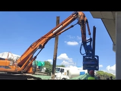 Hydraulic side grip pile driver